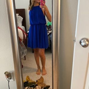 Open in the back. Beautiful Blue dress. Size Small